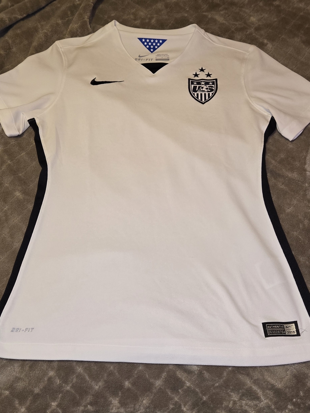Nike White Soccer Jersey with Black and Blue Details